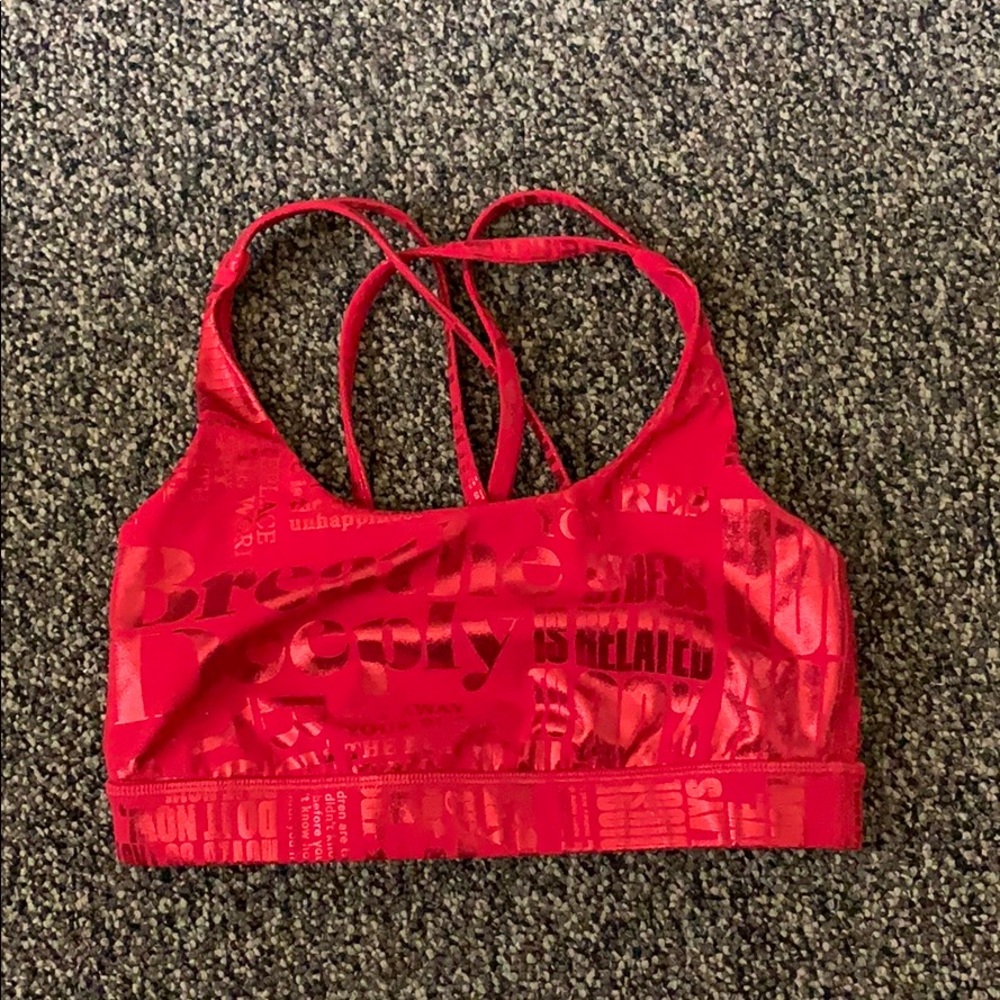 Red patterned energy sports bra